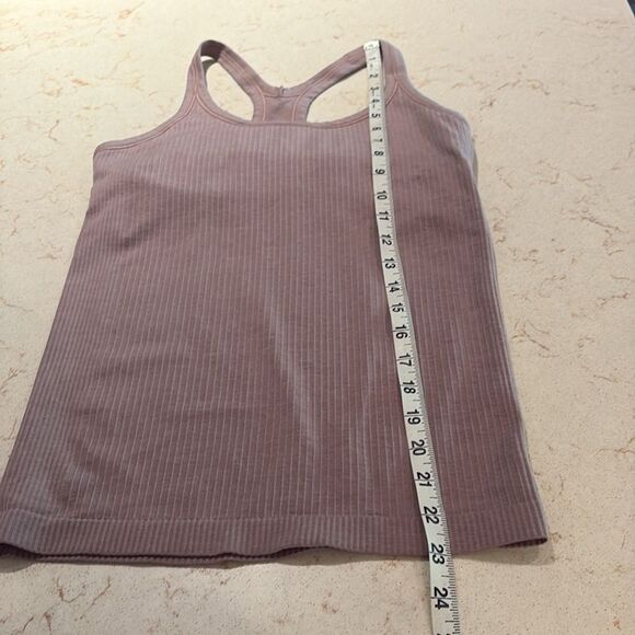 Lululemon Ebb to street tank ll SZ 6
Figue. Four way stretch.
Yoga
Athletic wear - Picture 15 of 16